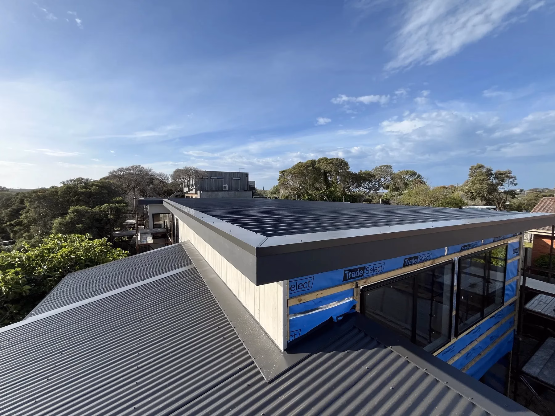 Metal roofing and flashings during a residential build